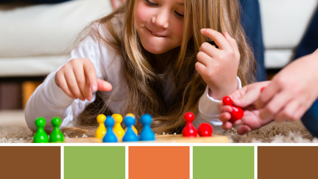 Girl playing board game